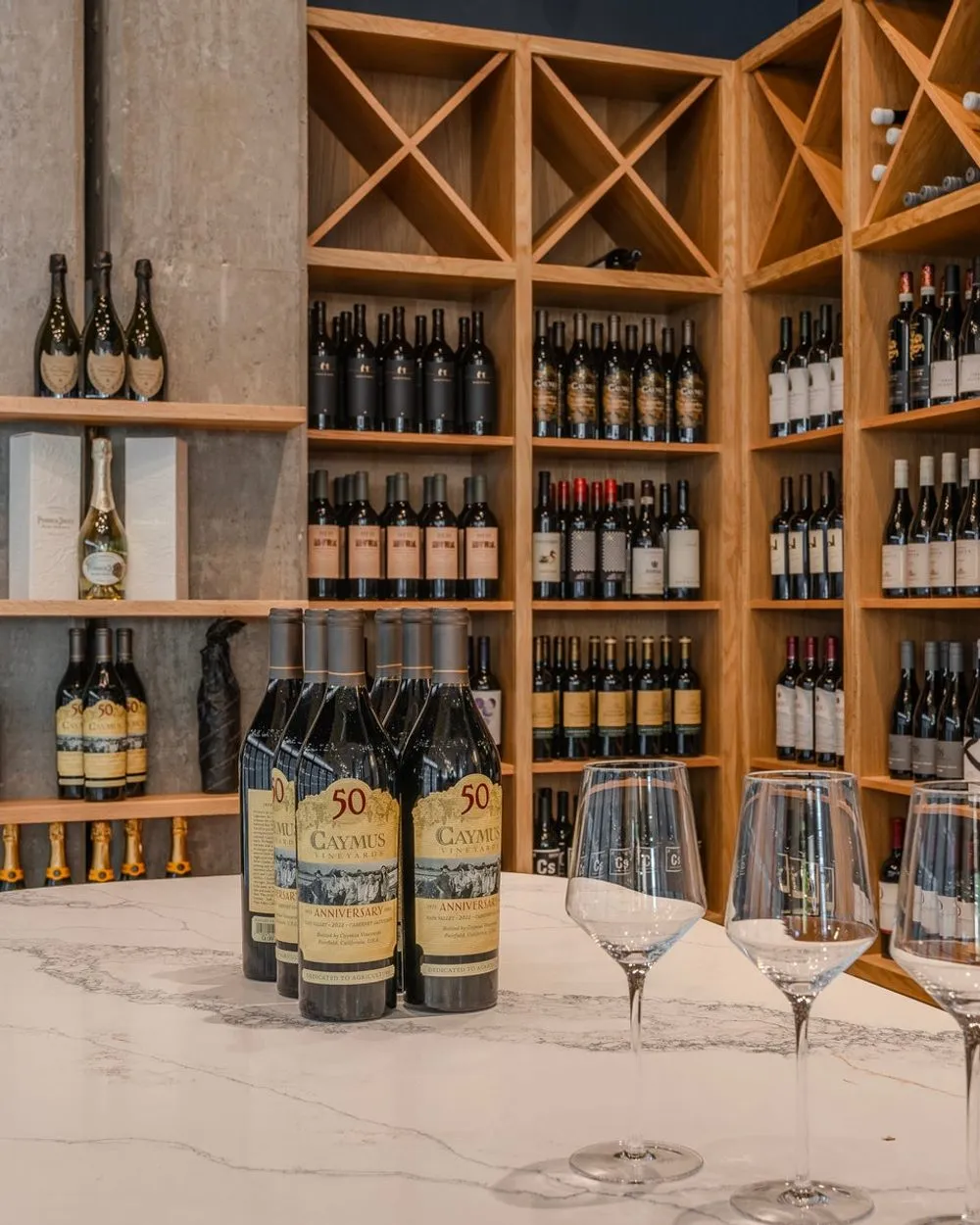 The curated wine wall at Le Marché Bleu